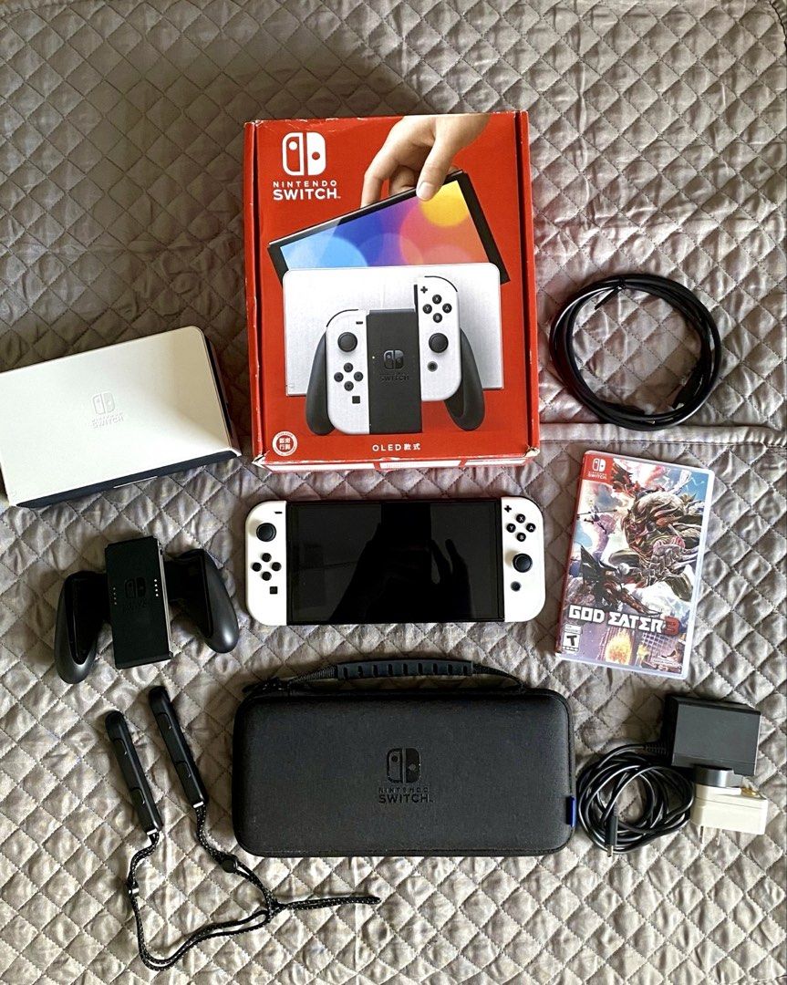 Nintendo Switch OLED White + FREE God Eater 3 & Accessories (Category: Nintendo) located in Manila. Submitted by ims.sshi (Listing ID 1469451017, Image 1). Description: Like-new condition, barely used, and no known issues! FREE inclusions: 🎁 God Eater 3 physical game 🎁 128GB SD card 🎁 Carrying case 📍 Meet-up: SM North EDSA / Santa Maria, Bulacan 📦 Nationwide shipping available (shipping fee c/o buyer) RFS: Upgrading to Switch 2. DM if intere
