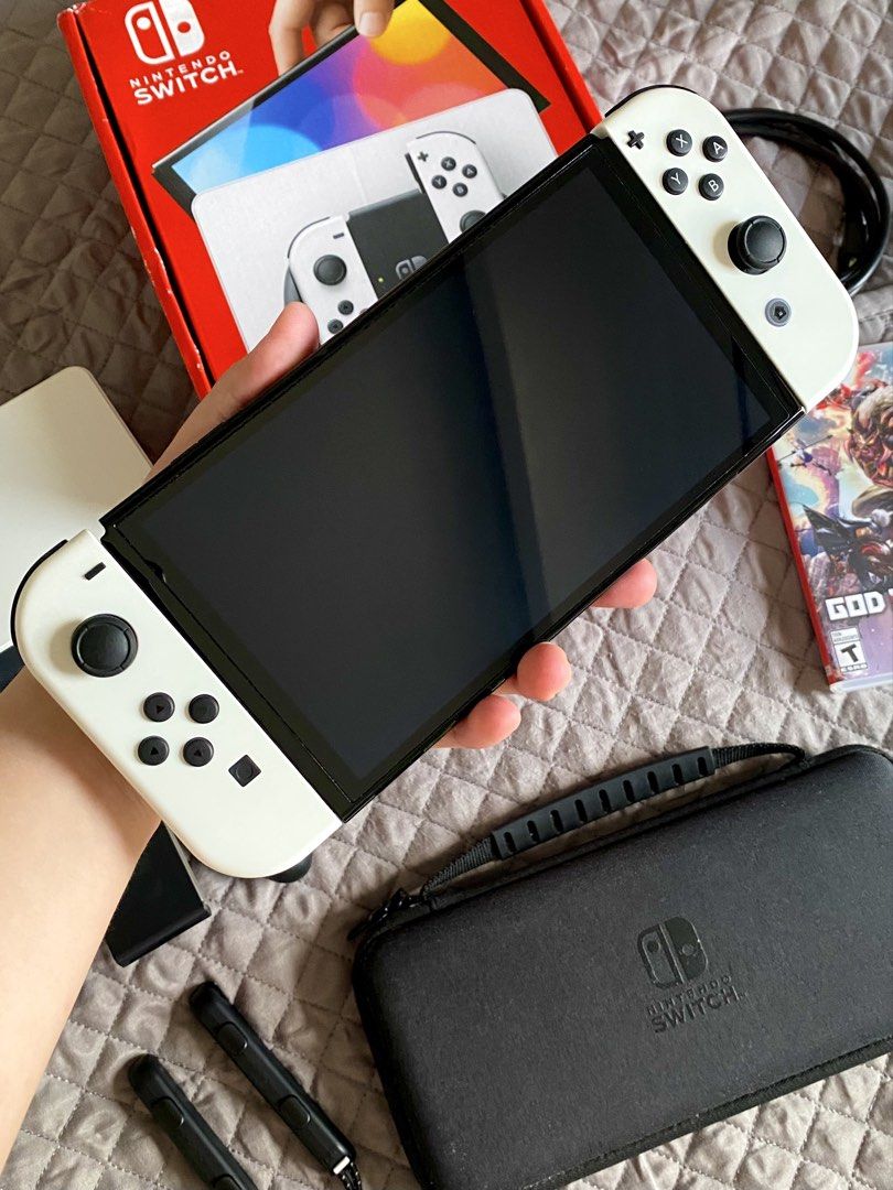Nintendo Switch OLED White + FREE God Eater 3 & Accessories (Category: Nintendo) located in Manila. Submitted by ims.sshi (Listing ID 1469451017, Image 3). Description: Like-new condition, barely used, and no known issues! FREE inclusions: 🎁 God Eater 3 physical game 🎁 128GB SD card 🎁 Carrying case 📍 Meet-up: SM North EDSA / Santa Maria, Bulacan 📦 Nationwide shipping available (shipping fee c/o buyer) RFS: Upgrading to Switch 2. DM if intere