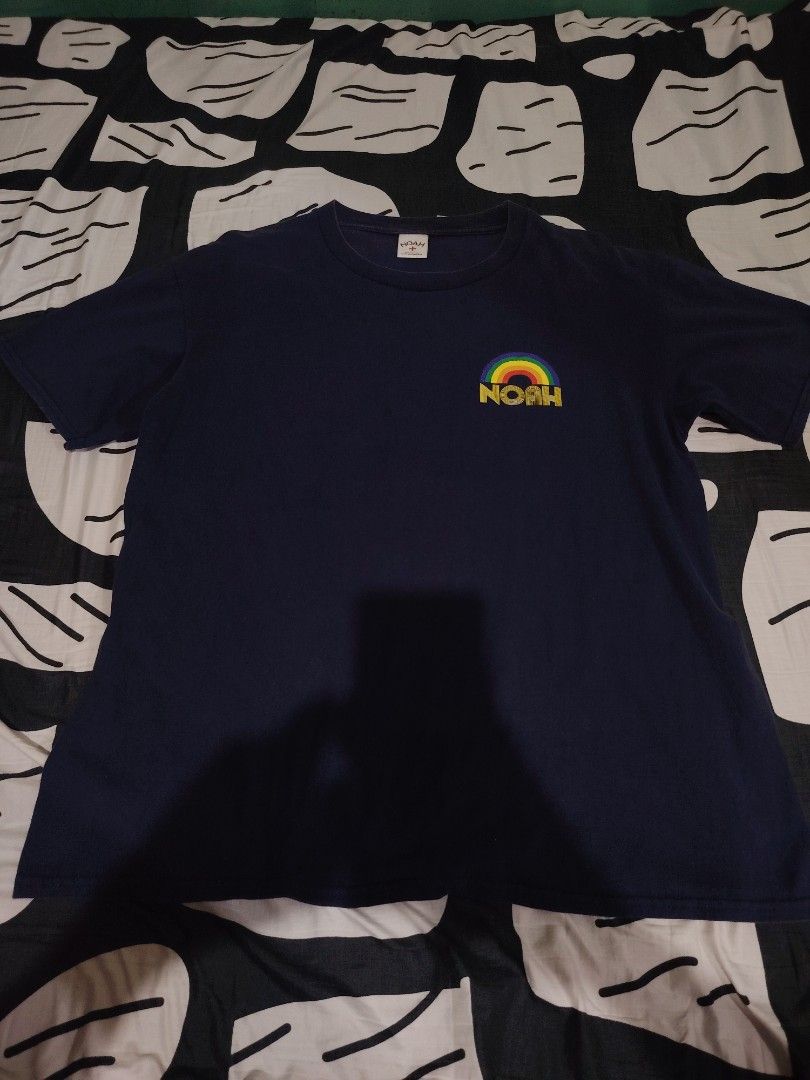 Noah NYC Rainbow Logo Tee Navy Blue (Category: Tshirts & Polo Shirts ) located in San Jose del Monte. Submitted by klowiboy (Listing ID 1469567796, Image 1). Description: - Brand: Noah NYC - Color: Navy Blue - Material: 100% Cotton, Made in Honduras - Design: Small rainbow logo on front, large '195 Mulberry St New York, NY' rainbow logo on back - Fit: Standard crew neck and short sleeves - Condition: Clean, graphics are fully intact with no crack