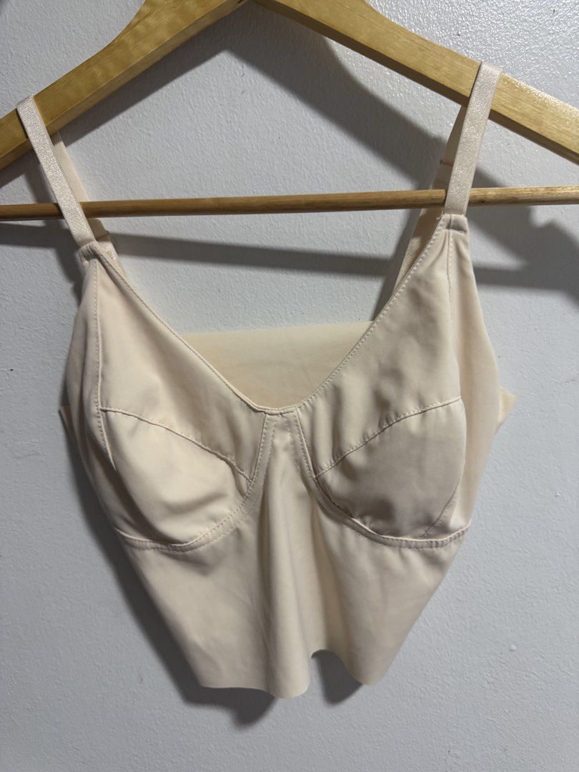 Nude Crop Top Bralette with Underwire Cups (Category: Sleeveless) located in Manila. Submitted by decluterthings888 (Listing ID 1469427704, Image 1). Description: - Color: Nude - Style: Crop top with sleek silhouette and V-neckline - Support: Structured underwire cups - Features: Adjustable shoulder straps, smooth fabric body, and perforated inner lining at the back - Pairing: Perfect with high-waisted bottoms - Condition: Clean and well-maintain