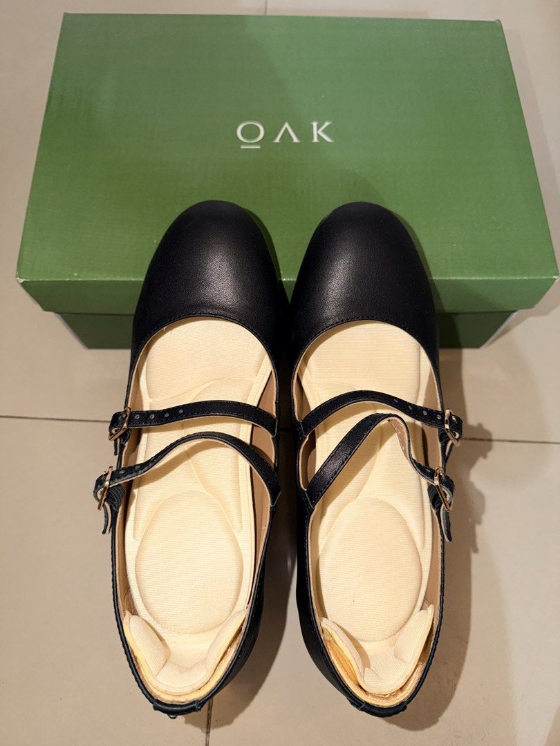 OAK Black Mary Jane Heels BARELY USED (Category: Heels) located in Pasig City. Submitted by mimimai123 (Listing ID 1469519142, Image 1). Description: - Brand: OAK - Color: Classic Black - Style: Mary Jane heels with double straps and adjustable gold-tone buckles - Heel: Comfortable chunky block heel with rounded toe - Interior: Neutral beige cushioned insoles for all-day wear - Inclusions: Comes with the original green box - Condition: Clean fini