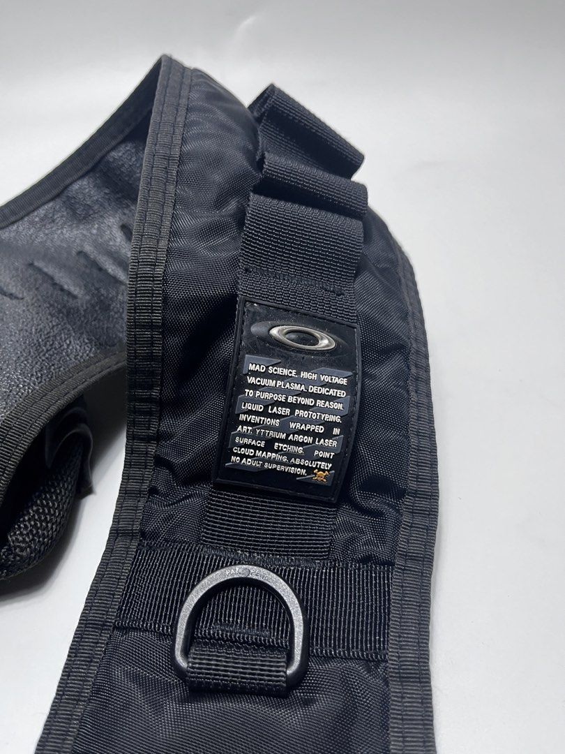 Oakley Sling Backpack Black Yellow (Category: Backpacks) located in Iloilo. Submitted by fromthebins.ilo2 (Listing ID 1469463930, Image 3). Description: - 100% durable nylon with stylish ripstop fabric panels - Bold black and yellow colorway with rubberized 'Mad Science, High Voltage' shoulder strap badge - Convenient mesh outer pocket and secure zip closures for great storage - Adjustable waist and shoulder straps with heavy-duty quick-release b