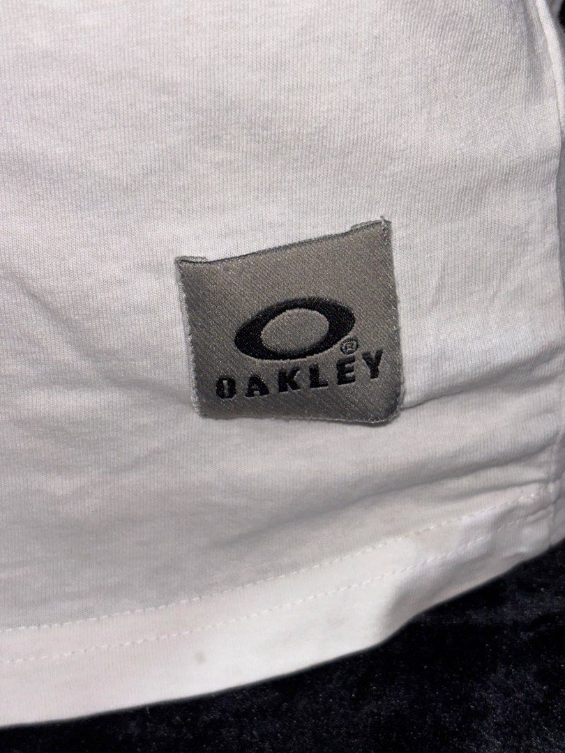 Oakley Tshirt (Category: Shirts) located in Pasig City. Submitted by swapwithme (Listing ID 1469497389, Image 3). Description: Fit to medium 8/10 condition Cotton tela.