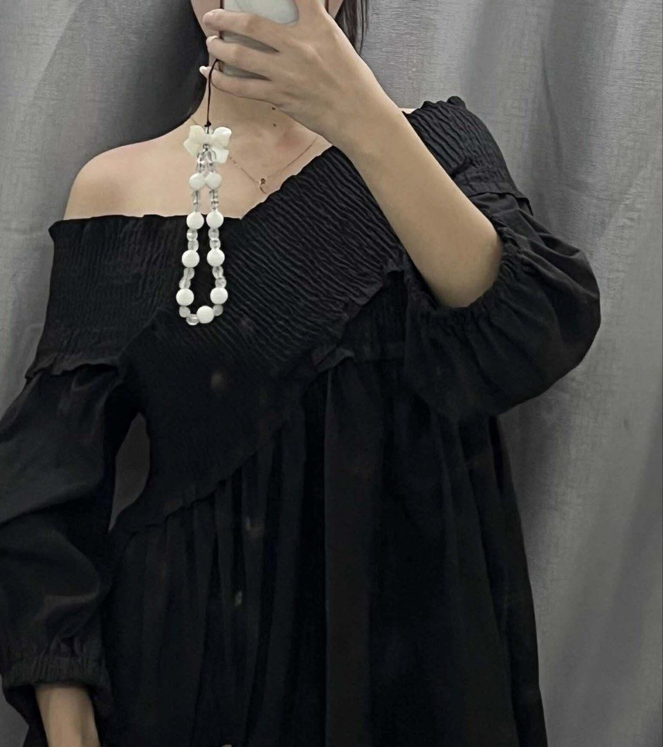 Two-Way Asymmetric Off-Shoulder Mini Dress (Category: Dresses) located in General Mariano Alvarez. Submitted by kascade (Listing ID 1469510094, Image 3). Description: - Color: Black - Style: Two-way styling — can be worn as an off-shoulder dress and styled asymmetrically - Details: Asymmetric pleated chest overlay - Fit: Smocked stretchy bodice and flowy flared skirt hitting above the knee - Sleeves: Long balloon sleeves with elastic cuffs - Cond