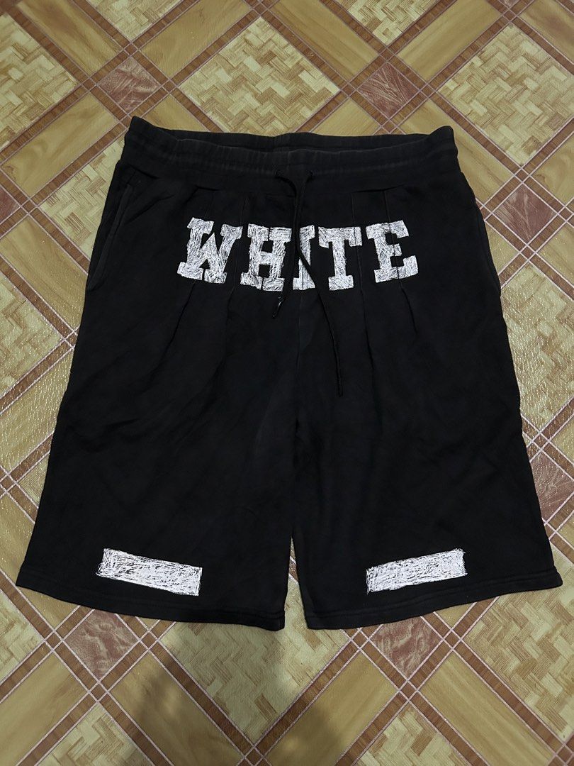 Off-White Black Sweatshorts with Diagonal Stripes (Category: Shorts) located in Manila. Submitted by garmentfinds.01 (Listing ID 1469523303, Image 1). Description: - Authentic Off-White black sweatshorts - Bold white printed branding across the front - Signature white diagonal stripe graphics on the back legs - Comfortable drawstring waistband with practical side pockets - Complete with official Off-White inner wash tags and branding labels - Con