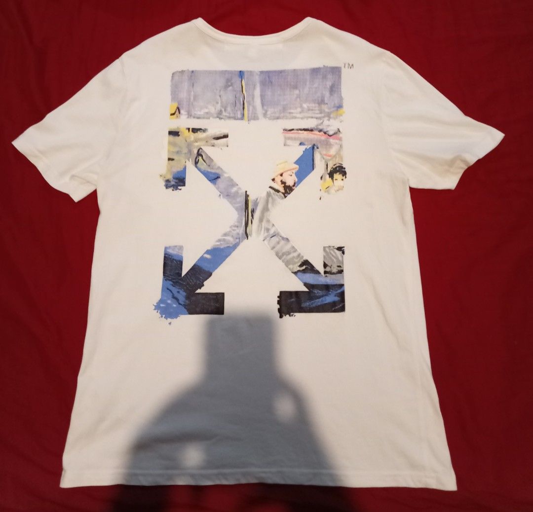 Off-White Caravaggio Shirt (Category: Tshirts & Polo Shirts ) located in Tuguegarao City. Submitted by nibordelac60216 (Listing ID 1469527103, Image 1). Description: Meduim on tag Width 21.5 Length- 28.5 Excellent condition Issue: 1pinhole. Che k photos fie details. Need wash .