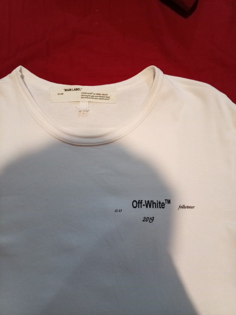 Off-White Caravaggio Shirt (Category: Tshirts & Polo Shirts ) located in Tuguegarao City. Submitted by nibordelac60216 (Listing ID 1469527103, Image 3). Description: Meduim on tag Width 21.5 Length- 28.5 Excellent condition Issue: 1pinhole. Che k photos fie details. Need wash .