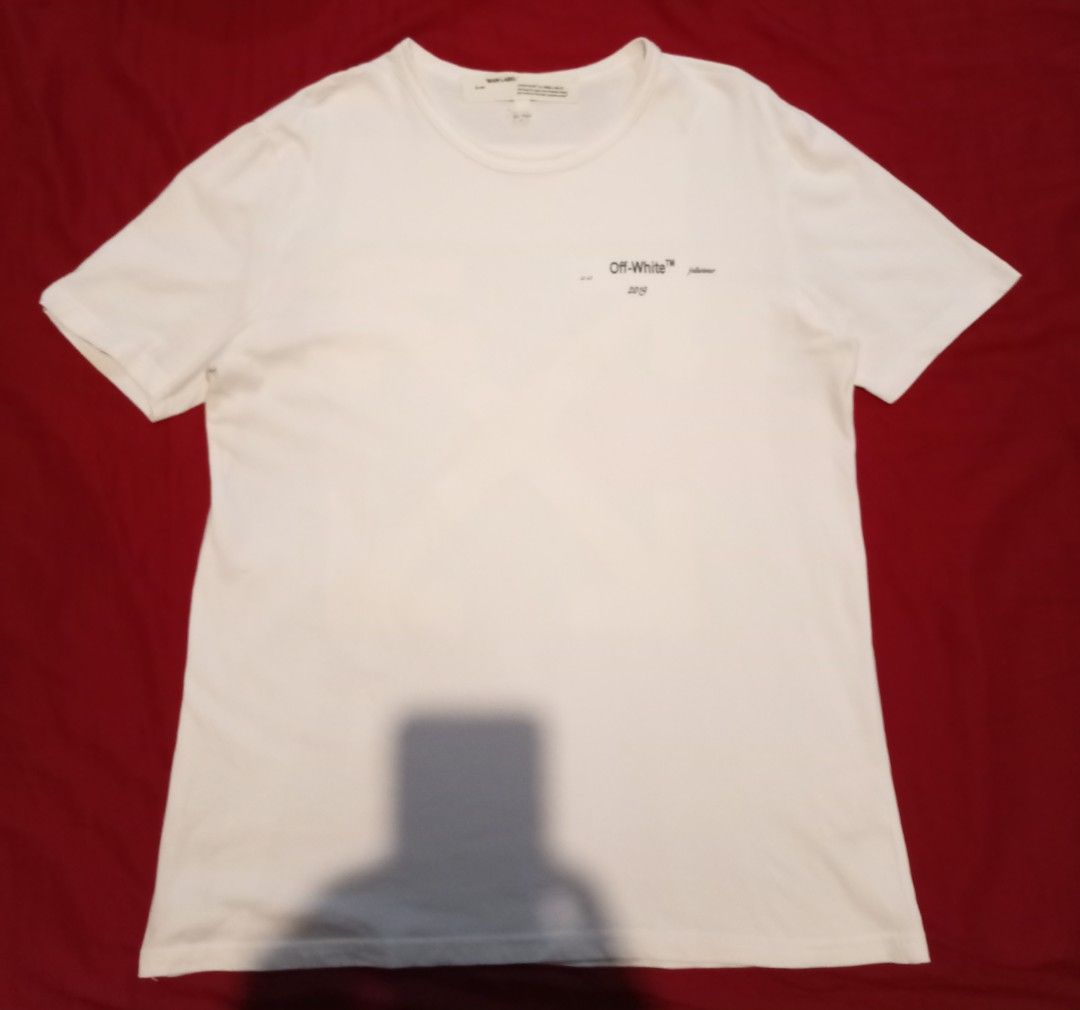 Off-White Caravaggio Shirt (Category: Tshirts & Polo Shirts ) located in Tuguegarao City. Submitted by nibordelac60216 (Listing ID 1469527103, Image 2). Description: Meduim on tag Width 21.5 Length- 28.5 Excellent condition Issue: 1pinhole. Che k photos fie details. Need wash .