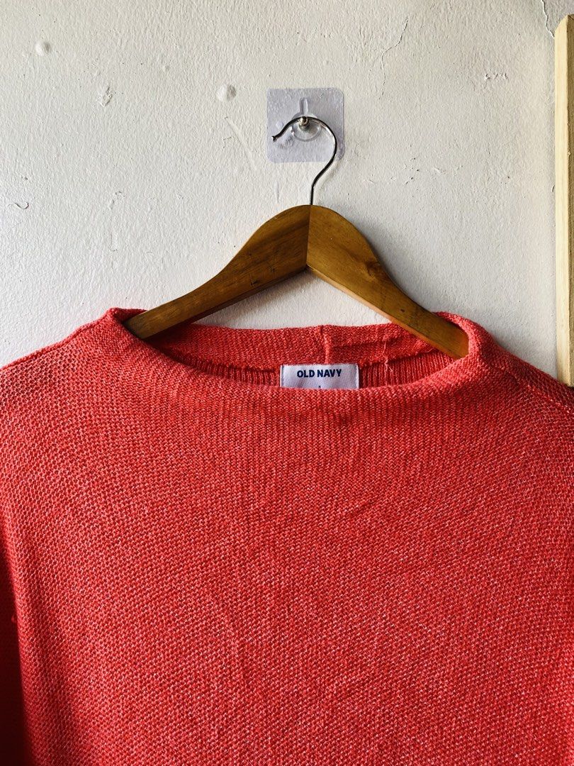 Old Navy Red Long Sleeve Knit Sweater (Category: Coats, Jackets and Outerwear) located in Caloocan City. Submitted by lovemyclothes21 (Listing ID 1469407568, Image 2). Description: - Brand: Old Navy - Size: Medium - Color: Bright coral red - Style: Relaxed fit with a chic boatneck and long sleeves - Material: Cozy textured knit - Condition: Excellent, clean look - Perfect for pairing with jeans or trousers during cooler weather.