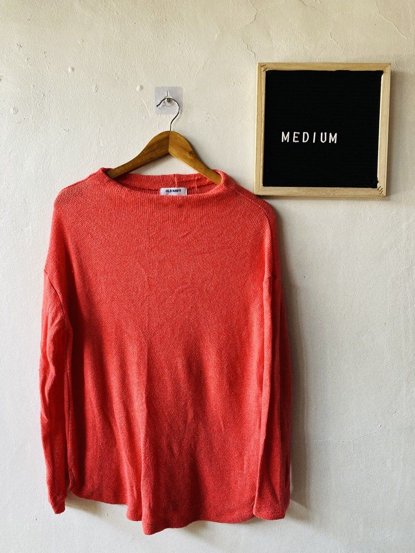 Old Navy Red Long Sleeve Knit Sweater (Category: Coats, Jackets and Outerwear) located in Caloocan City. Submitted by lovemyclothes21 (Listing ID 1469407568, Image 1). Description: - Brand: Old Navy - Size: Medium - Color: Bright coral red - Style: Relaxed fit with a chic boatneck and long sleeves - Material: Cozy textured knit - Condition: Excellent, clean look - Perfect for pairing with jeans or trousers during cooler weather.