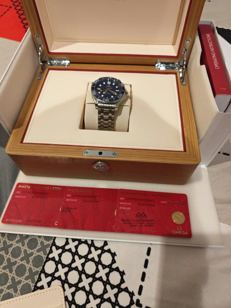 OMEGA Seamaster Diver 300M Blue Dial Watch (Category: Men's Watches) located in Manila. Submitted by reymondsa17617 (Listing ID 1469416265, Image 2). Description: - Brand/Model: OMEGA Seamaster Diver 300M - Movement: Automatic, keeps great time - Dial Color: Classic Blue - Material: Heavy-duty stainless steel bracelet and case - Inclusions: Original wooden presentation box and operating instructions - Condition: Brand New .