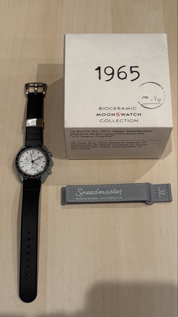 Omega x Swatch MoonSwatch 1965 (Category: Luxury Watches) located in Makati City. Submitted by raphcamero (Listing ID 1469466611, Image 2). Description: - Condition: 9.8/10 (Like new, worn only once) * Complete set with original box * Original Swatch strap included * Original Asprey replacement strap currently installed * Original receipt included (bought lasy may 2026) * Well-kept and in excellent condition Selling for ₱14,000 negotiable. RFS: N