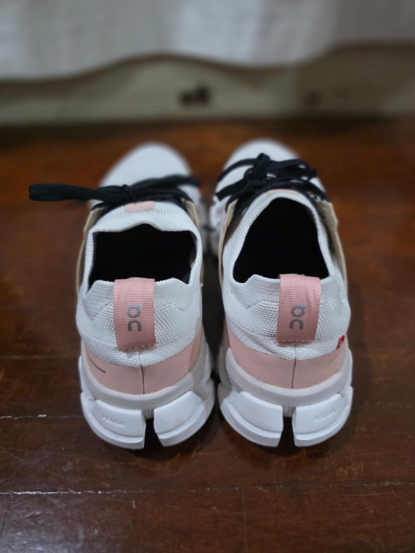 On Cloudswift Size US 7 (Category: Sneakers) located in Quezon City. Submitted by sec0nd.st0ry (Listing ID 1469503510, Image 2). Description: - Brand: On Cloud - Color: White and pink with black printed laces - Upper: Lightweight mesh with a breathable perforated toe box - Sole: Thick cushioned sole featuring signature cloud pods for ultimate comfort - Details: Signature On logo on the sides, tongue, and heel pull tab - Condition: Minor signs of 