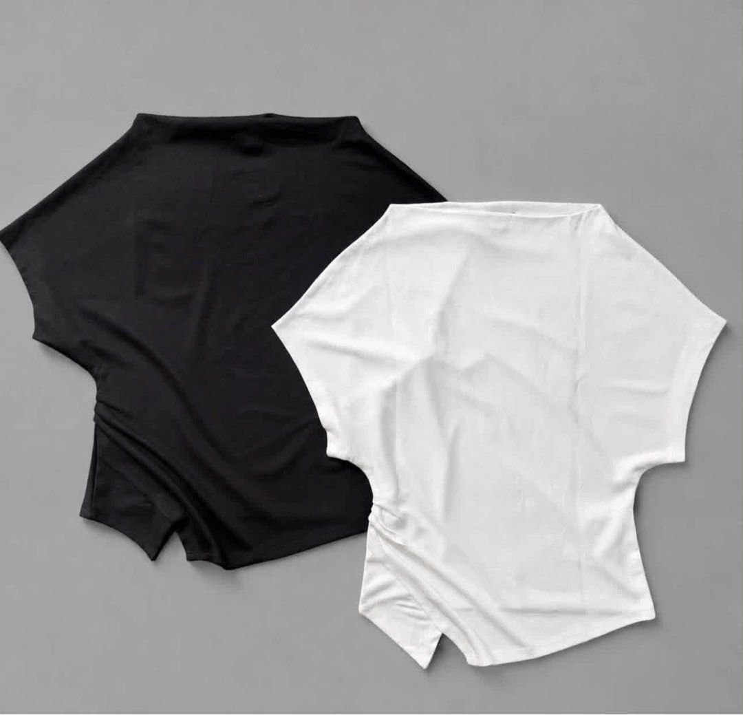 One Shoulder Draped Asymmetric Top White Black (Category: Sleeveless) located in Pasacao. Submitted by eommacollections_ (Listing ID 1469551405, Image 1). Description: - Trendy one-shoulder asymmetric design with stylish side gathering - Crafted from soft, stretchy fabric for ultimate comfort - Drapes nicely, perfect to pair with jeans or skirts - Available colors: Classic White and Black - Versatile piece for casual days or glam nights out.