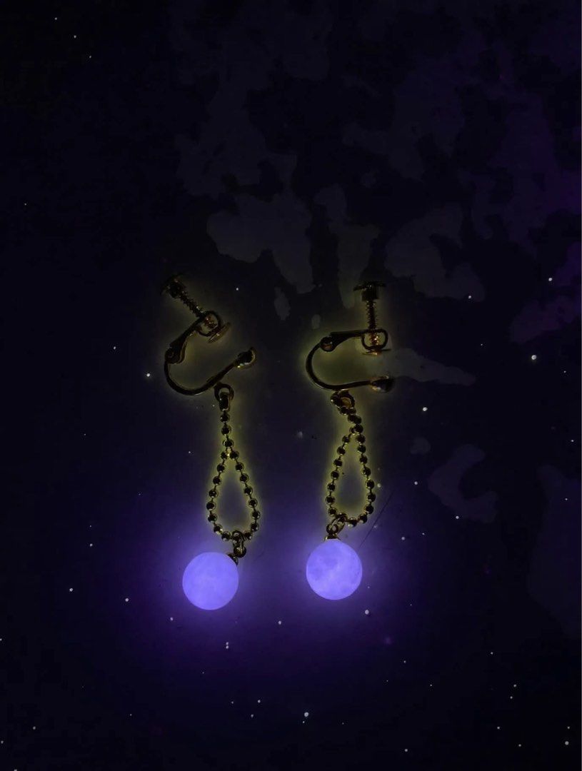 Opal screwed earings with active uv light pearl (Category: Other Accessories) located in Santo Tomas. Submitted by yengcarawa67764 (Listing ID 1469396629, Image 2). Description: a pair of screw-back drop clip-on earrings in a gold-tone finish with a beaded chain drop and a pale blue or lavender-tinted round bead (such as chalcedony, jade, or shell). No tarnish ang ganda pa ng gold nya as in.