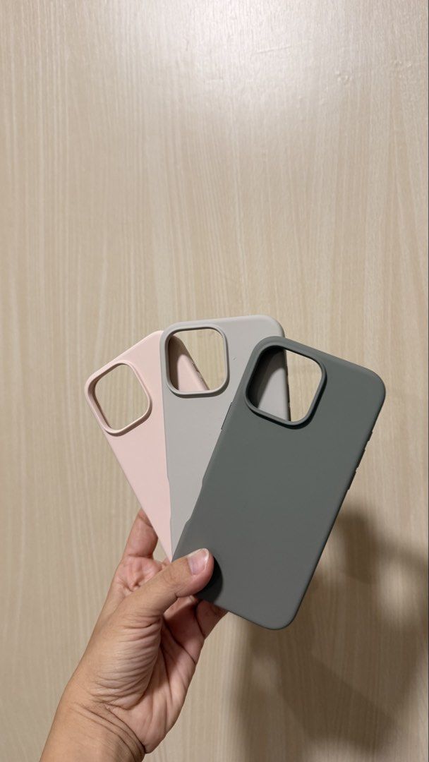 Orig Elago phone case 16 Pro Max (Category: Cases & Sleeves) located in Manila. Submitted by marixia (Listing ID 1469534250, Image 1). Description: - Brand: Original Elago - Compatibility: iPhone 16 Pro Max - Material: Premium smooth silicone with soft inner lining - Features: MagSafe compatible ring design, camera cutout protection - Condition: Excellent, like new (Layer 4) - Colors: Pastel Pink, Light Gray, Dark Green.