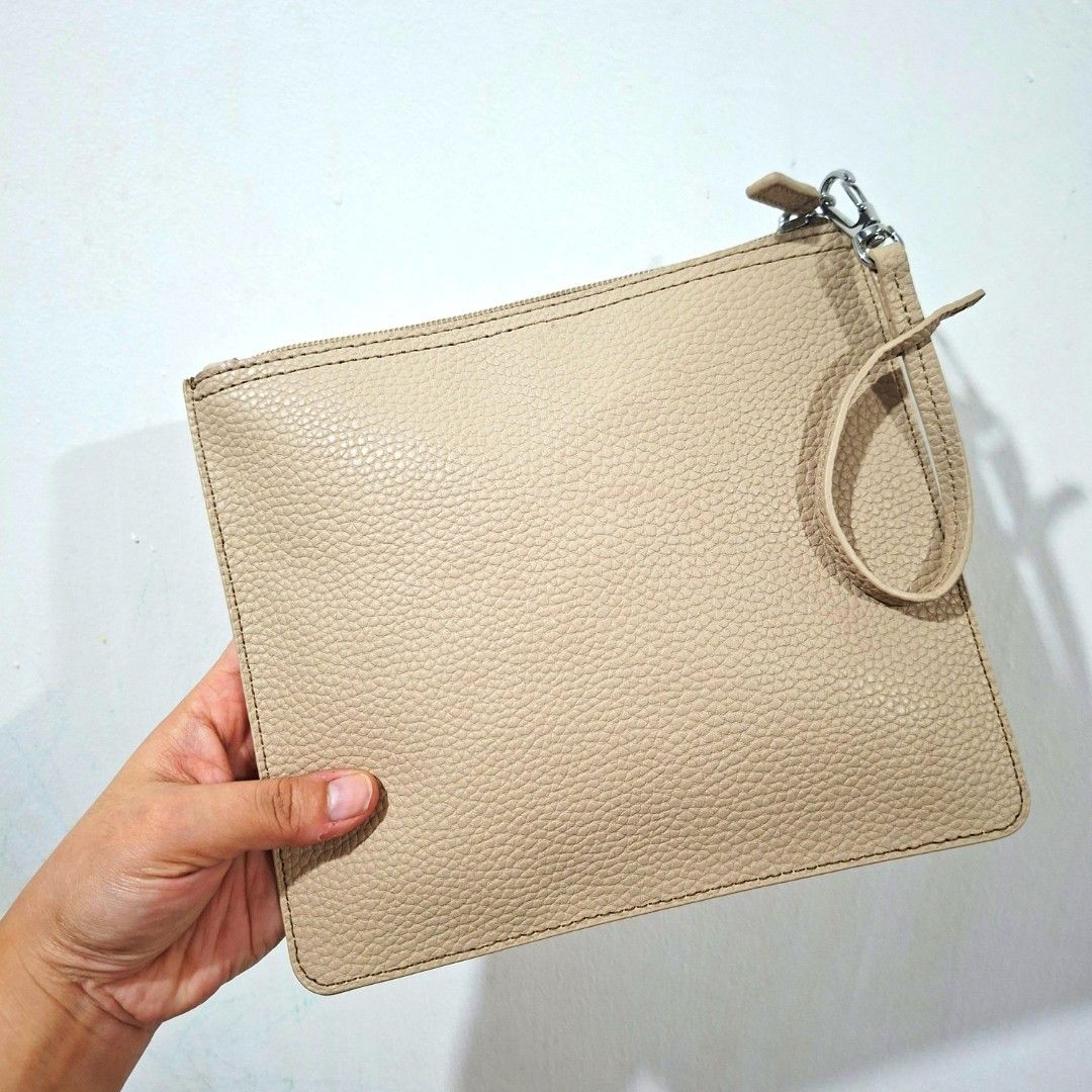 Original LACOSTE Genuine Leather Mini Pouch (Category: Clutches) located in Cagayan de Oro. Submitted by langscloset (Listing ID 1469489584, Image 2). Description: like new, no issue at all. original lacoste. this pouch is from my Lacoste tote bag, used once only. .