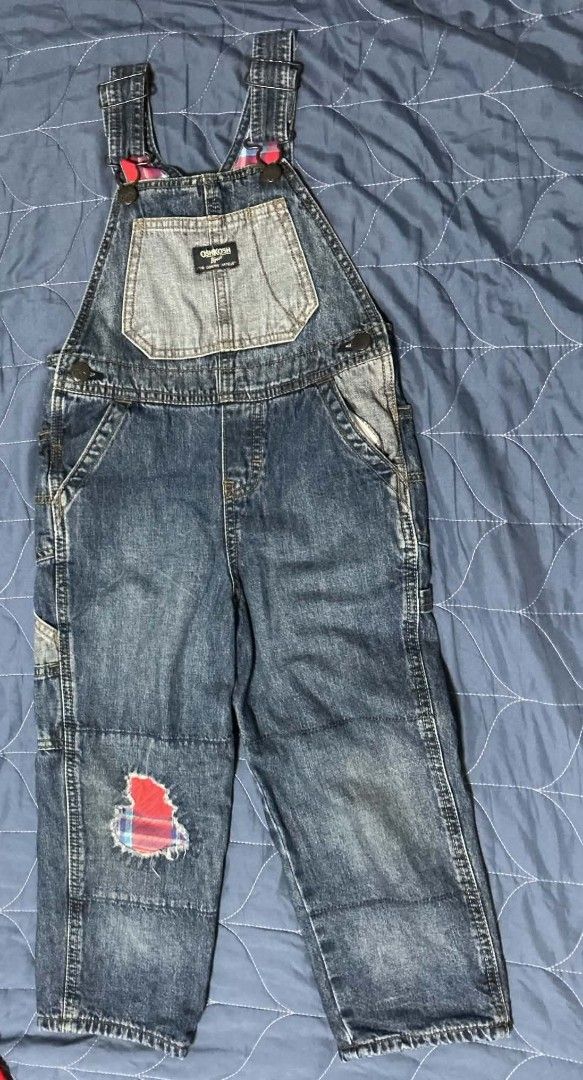 OshKosh B'Gosh Denim Overalls with Plaid Patch (Category: Babies & Kids Fashion) located in La Trinidad. Submitted by austriajoh66775 (Listing ID 1469511670, Image 1). Description: - Classic OshKosh B'Gosh denim overalls for kids - Medium blue wash with fun red and blue plaid knee patch and strap lining - Adjustable shoulder straps for a custom fit - Functional front bib pocket with iconic logo patch - Durable denim material built for play, compl