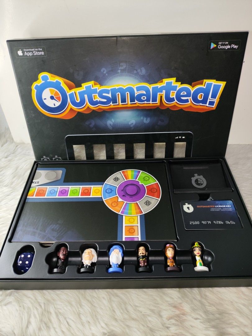 Outsmarted! The Live Quiz Show Board Game (Category: Board Games & Puzzles) located in Cavite. Submitted by tinetaclesss (Listing ID 1469507049, Image 1). Description: - Game: Outsmarted! Live quiz show board game - Inclusion: Complete set with board, 6 character figurines, dice, license key card, stand, and instruction manual - Features: App integration available on App Store and Google Play for smartphones and tablets - Condition: Box packaging