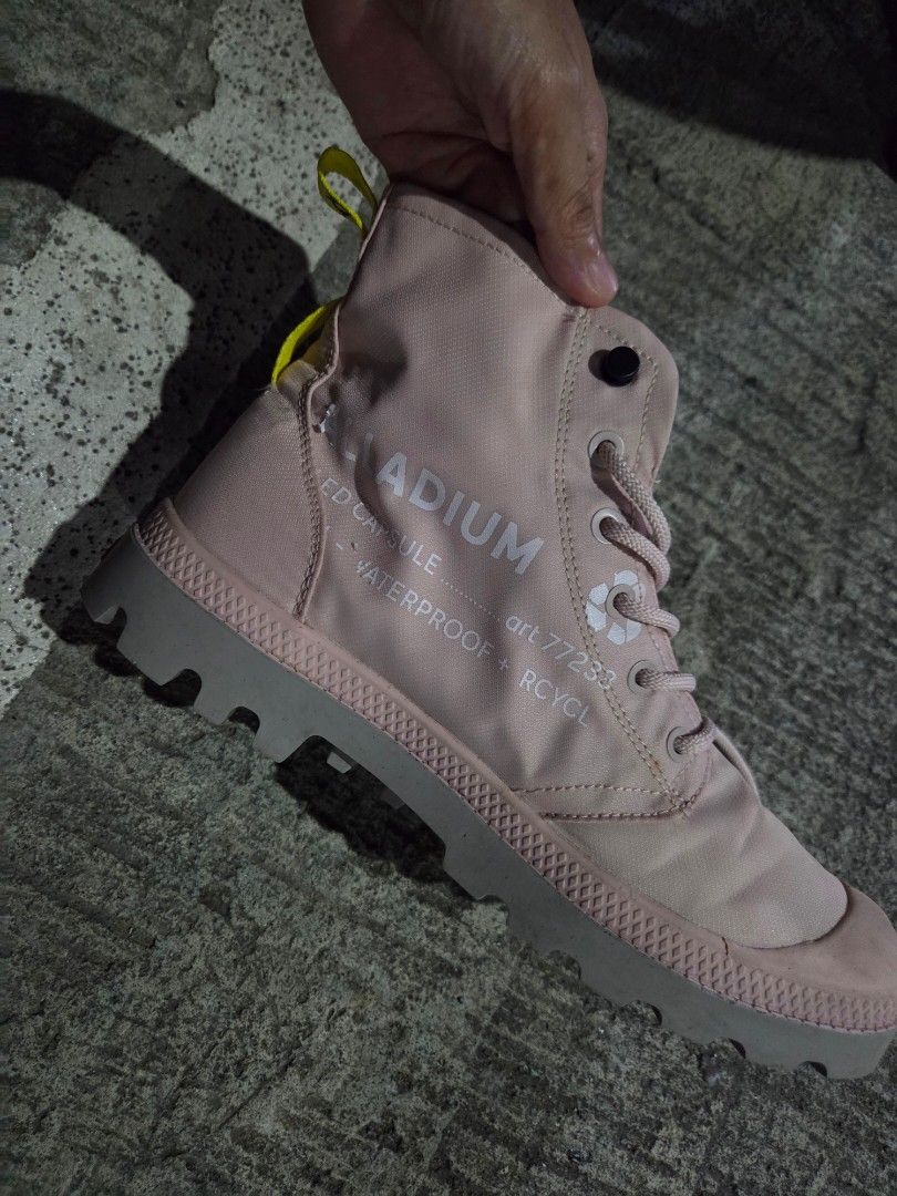 Palladium Waterproof Recycled Pink Boots (Category: Boots) located in Manila. Submitted by mysticrabbit.284012 (Listing ID 1469520992, Image 1). Description: - Brand: Palladium - Color: Pink with chunky grey lug sole - Material: Waterproof recycled material - Design: High-top style with matching laces and yellow graphic heel pull tabs - Details: Branded logo patch on tongue, art number 77233 printed on the side - Condition: Excellent/Like new - P