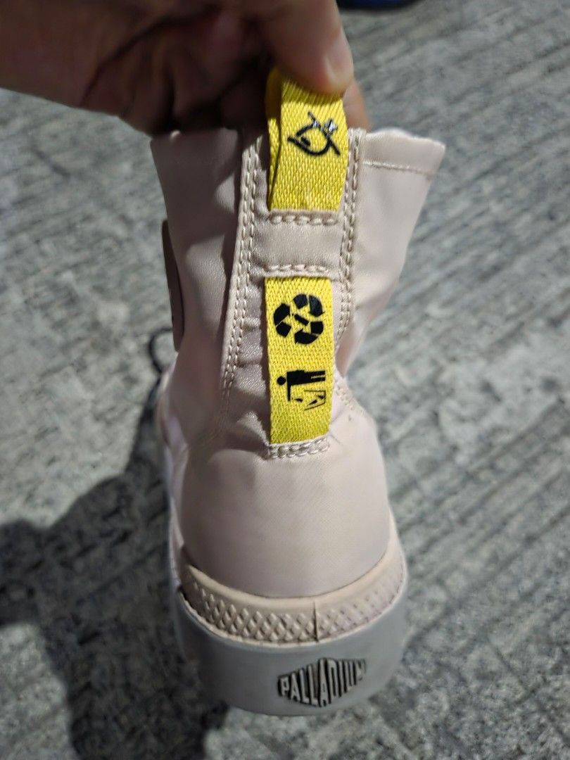 Palladium Waterproof Recycled Pink Boots (Category: Boots) located in Manila. Submitted by mysticrabbit.284012 (Listing ID 1469520992, Image 3). Description: - Brand: Palladium - Color: Pink with chunky grey lug sole - Material: Waterproof recycled material - Design: High-top style with matching laces and yellow graphic heel pull tabs - Details: Branded logo patch on tongue, art number 77233 printed on the side - Condition: Excellent/Like new - P
