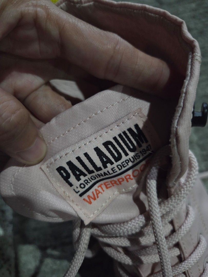 Palladium Waterproof Recycled Pink Boots (Category: Boots) located in Manila. Submitted by mysticrabbit.284012 (Listing ID 1469520992, Image 2). Description: - Brand: Palladium - Color: Pink with chunky grey lug sole - Material: Waterproof recycled material - Design: High-top style with matching laces and yellow graphic heel pull tabs - Details: Branded logo patch on tongue, art number 77233 printed on the side - Condition: Excellent/Like new - P