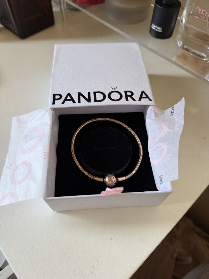 Pandora Rose Gold Snake Chain Bracelet (Category: Bracelets) located in Quezon City. Submitted by ellenaj31 (Listing ID 1469564839, Image 1). Description: Pandora 14k rose gold plated Moments Snake Chain Bracelet. 10.3mm deep, 10.3mm high, 3mm wide Still have receipts. Bought it from Pandora SM Baguio Orig price is 12k Packaging: Includes original white branded presentation box. .