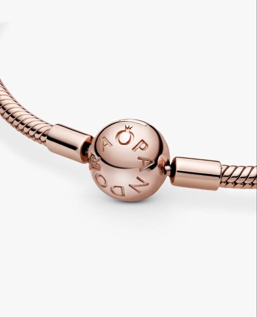 Pandora Rose Gold Snake Chain Bracelet (Category: Bracelets) located in Quezon City. Submitted by ellenaj31 (Listing ID 1469564839, Image 3). Description: Pandora 14k rose gold plated Moments Snake Chain Bracelet. 10.3mm deep, 10.3mm high, 3mm wide Still have receipts. Bought it from Pandora SM Baguio Orig price is 12k Packaging: Includes original white branded presentation box. .