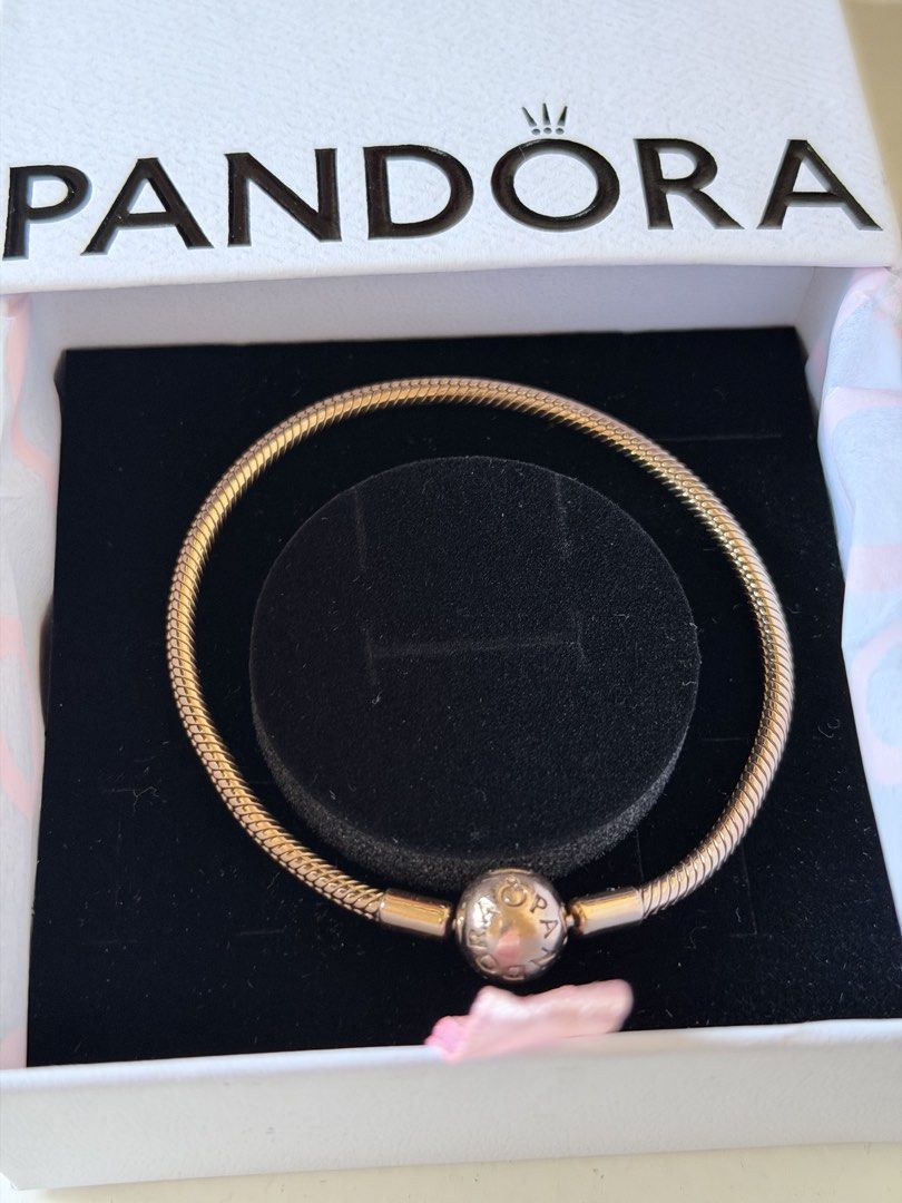 Pandora Rose Gold Snake Chain Bracelet (Category: Bracelets) located in Quezon City. Submitted by ellenaj31 (Listing ID 1469564839, Image 2). Description: Pandora 14k rose gold plated Moments Snake Chain Bracelet. 10.3mm deep, 10.3mm high, 3mm wide Still have receipts. Bought it from Pandora SM Baguio Orig price is 12k Packaging: Includes original white branded presentation box. .