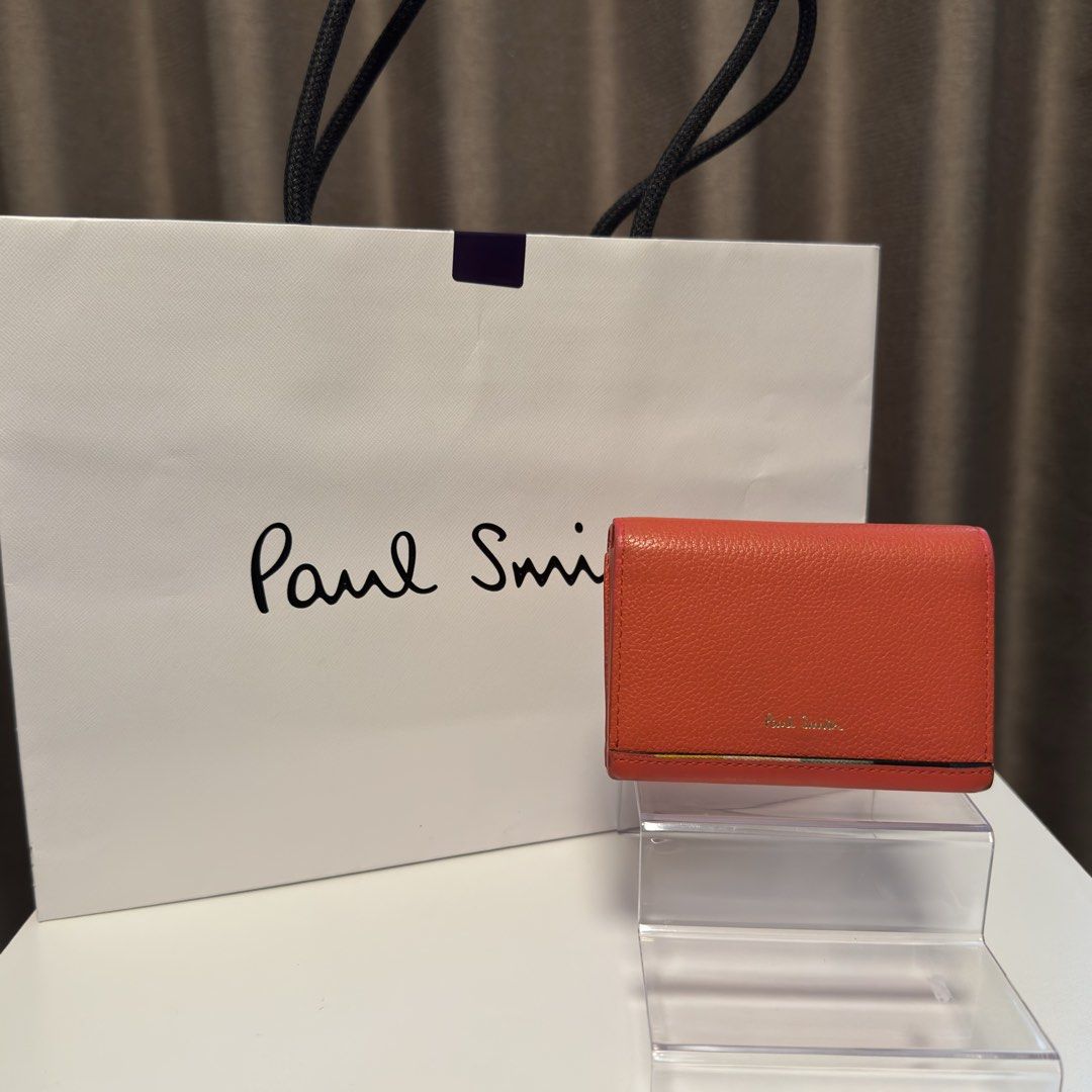 Paul Smith compact cardholder (Category: Wallets & Card Holders) located in Quezon City. Submitted by hintstreet (Listing ID 1468712863, Image 1). Description: Super sale na since nag fade ng konti ang gilid but hindi naman noticeable Cash and card slot is still in very good condition.