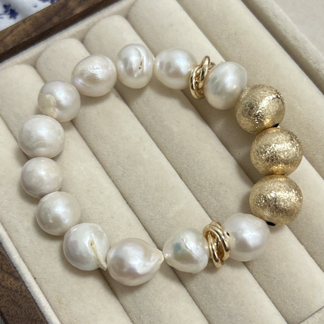 Pearl with round gold accent bracelet (Category: Bracelets) located in Lipa City. Submitted by avenueusco_ph (Listing ID 1469506943, Image 2). Description: Pearl are not perfect but luster is good ✨ With visible fishbites, growth color but not visible when worn. ✨ Good luster 📍 Not so round 🦪 12mm 8”.
