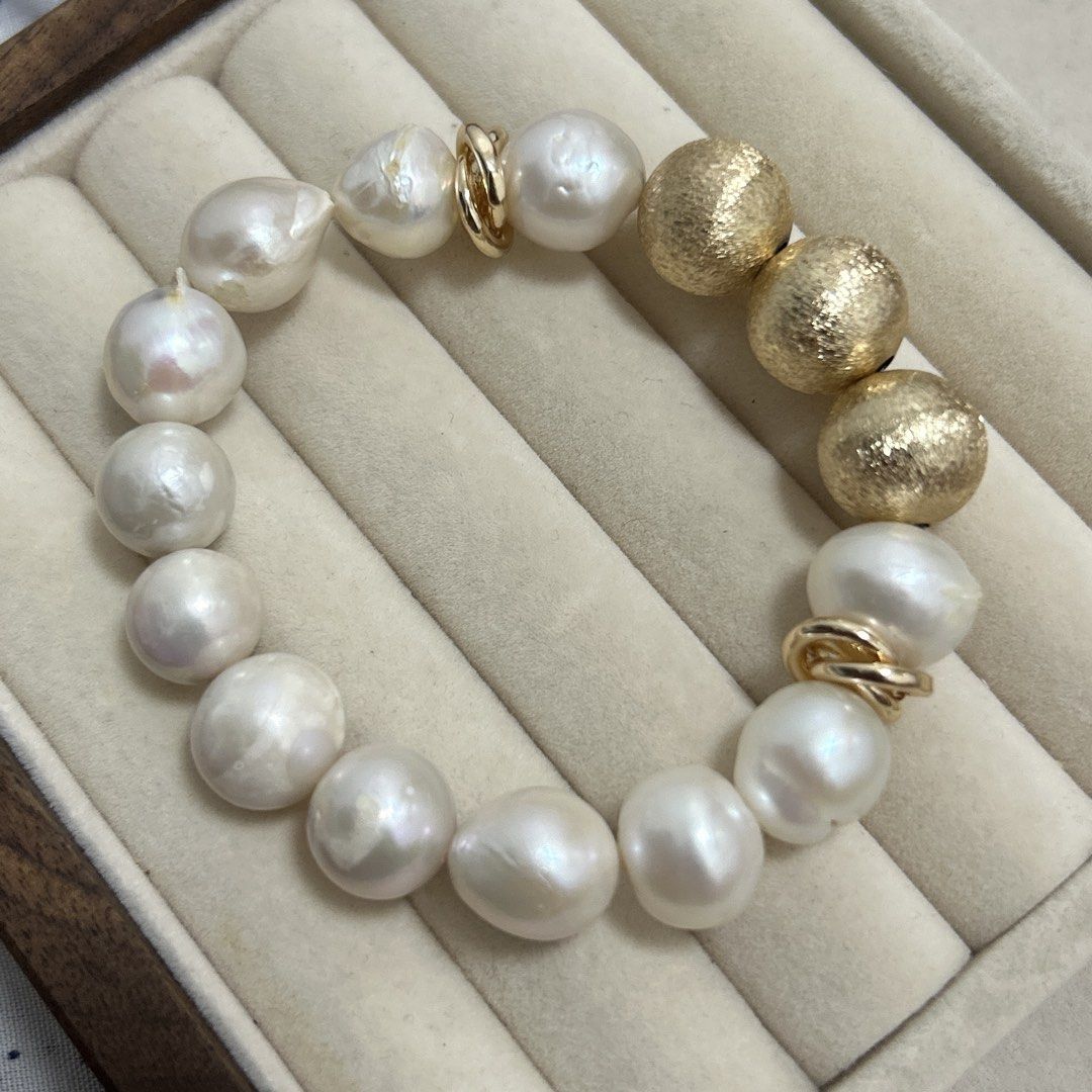 Pearl with round gold accent bracelet (Category: Bracelets) located in Lipa City. Submitted by avenueusco_ph (Listing ID 1469506943, Image 1). Description: Pearl are not perfect but luster is good ✨ With visible fishbites, growth color but not visible when worn. ✨ Good luster 📍 Not so round 🦪 12mm 8”.