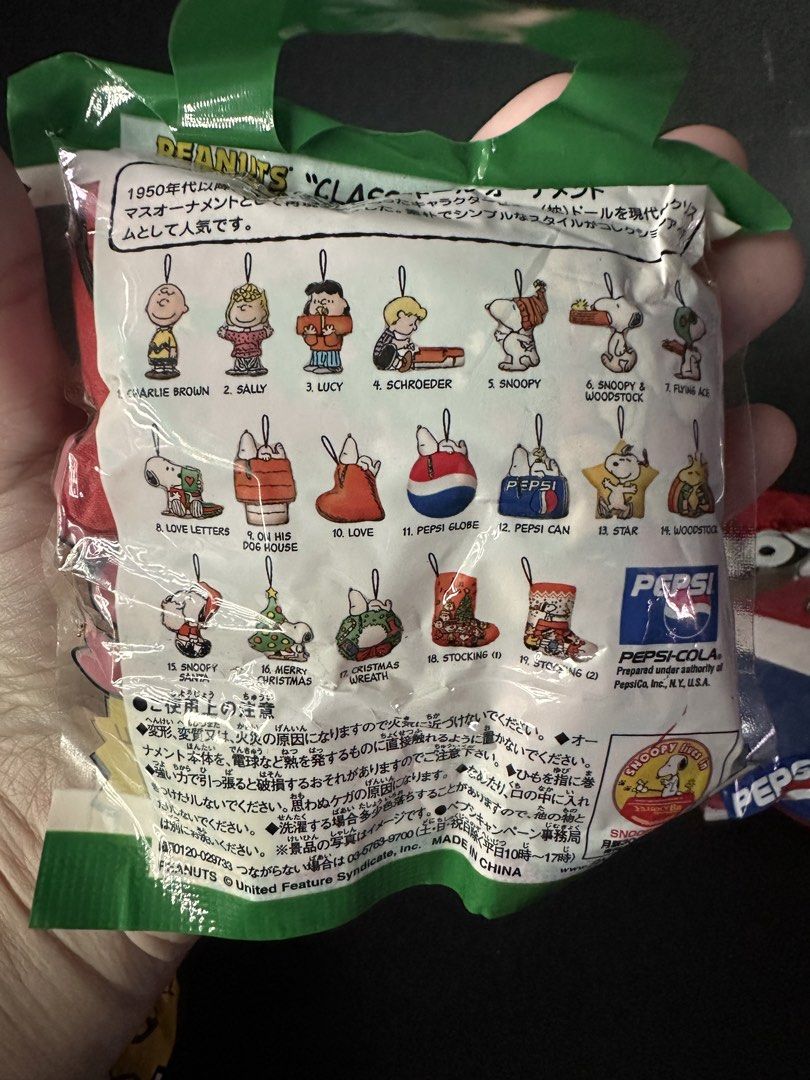 PEPSI Snoopy Peanuts Xmas tree Ornaments (Category: Plushies & Soft Toys) located in Cainta. Submitted by mochimochiko (Listing ID 1469417523, Image 2). Description: - Set of 5 PEPSI x Peanuts mini pillow christmass tree doll ornaments - Brand new and sealed in original packaging - Features festive holiday designs including Charlie Brown, Snoopy in Santa hat, Christmas wreath, and Pepsi globe - Great collectible set or gift for Peanuts fans.