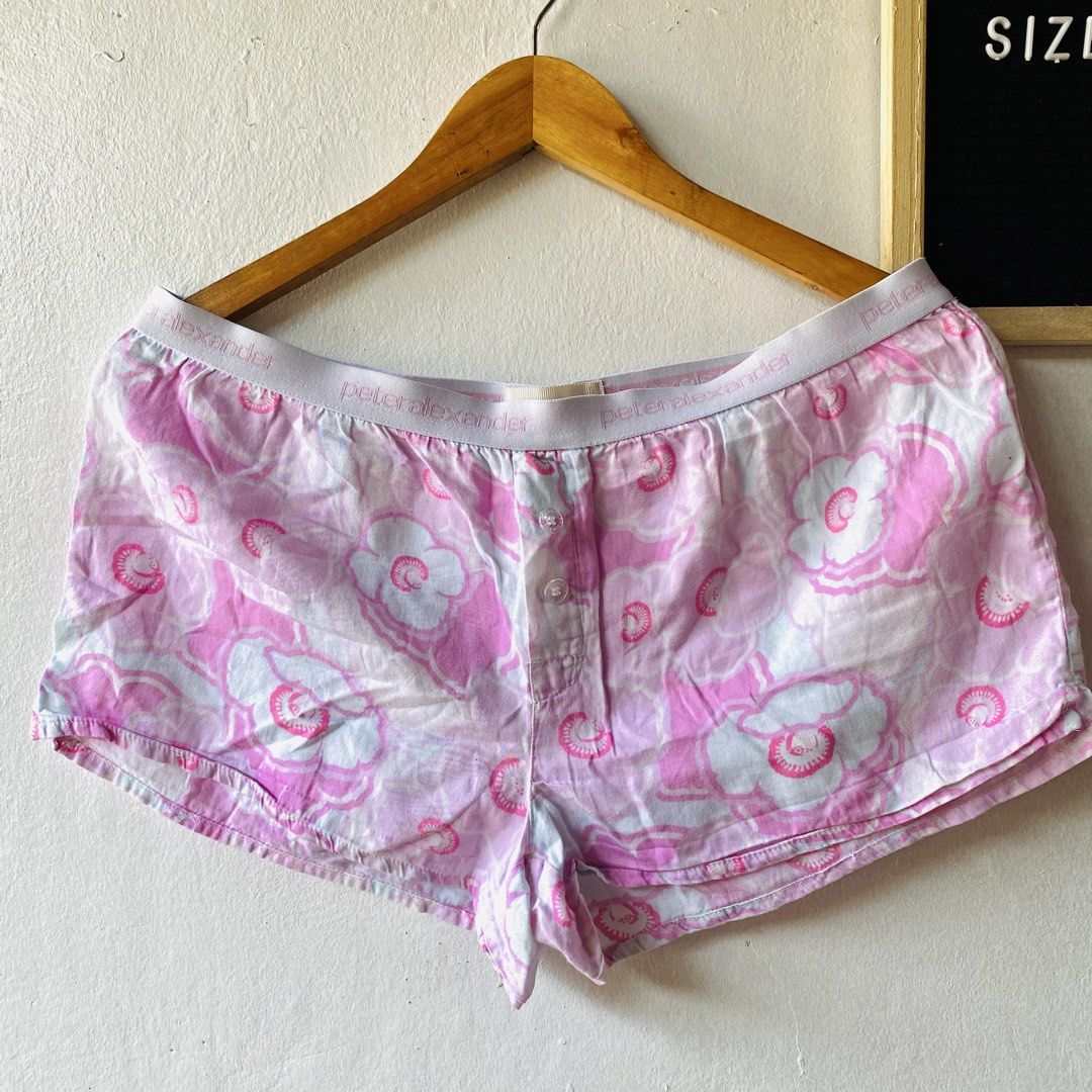 Peter Alexander Pink Floral Shorts (Category: Shorts) located in Caloocan City. Submitted by lovemyclothes21 (Listing ID 1469406787, Image 2). Description: - Brand: Peter Alexander - Item: Pajama Shorts - Size: S (Fits waist 38 to 42 inches) - Design: Pink & white floral pattern with branded elastic waistband - Details: Front button placket, lightweight cotton material - Perfect for: Sleeping and lounging.