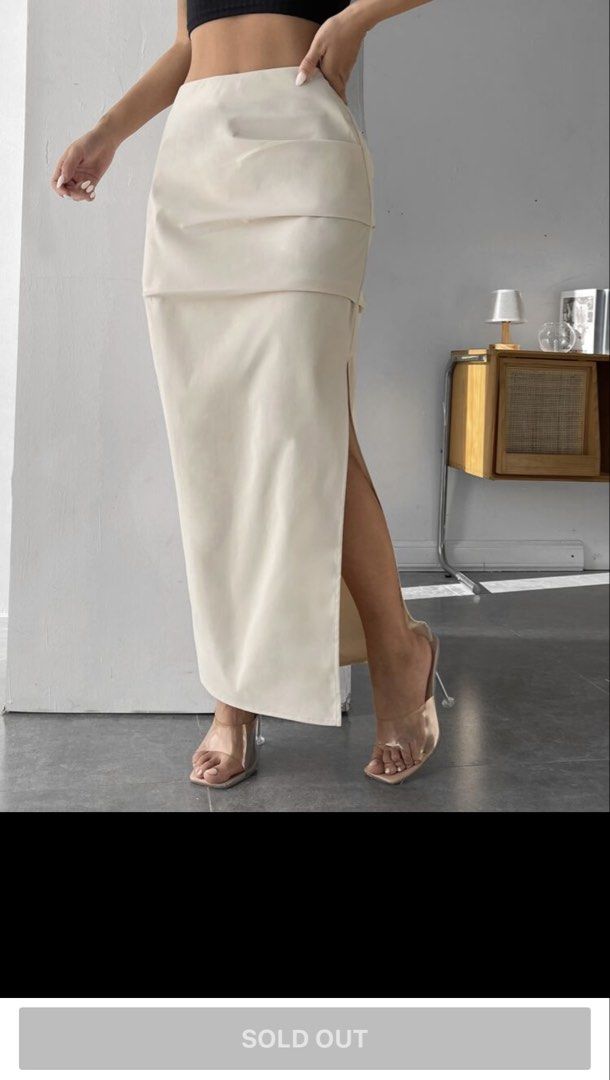 PETITE FOLD PLEATED THIGH SKIRT (Category: Skirts) located in Paranaque City. Submitted by marengkondo23 (Listing ID 1469443732, Image 2). Description: - Color: Clean neutral cream Sleek FITS XS TO SMALL.