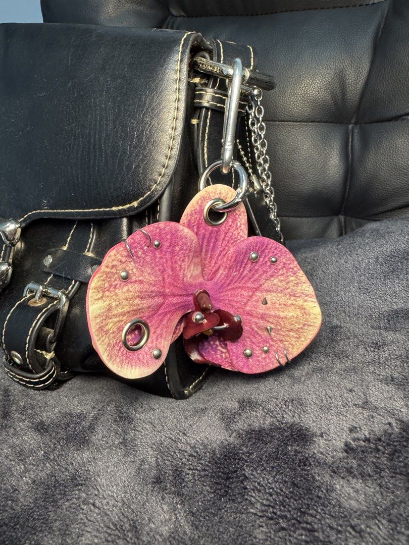 Pierced Floral Flower Bag Charms (Category: Charms) located in Manila. Submitted by eyes.on.ally (Listing ID 1469455112, Image 3). Description: 240php each orchid 160php lily.