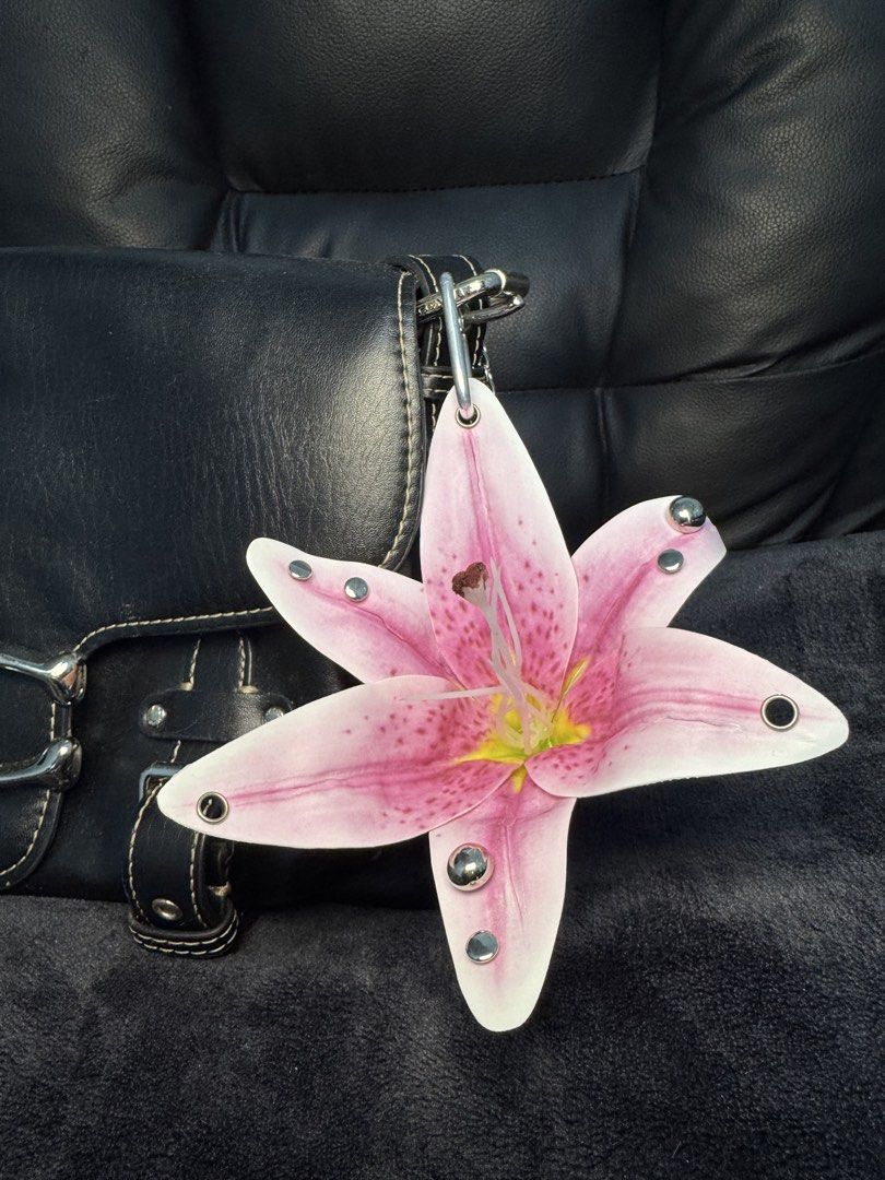 Pierced Floral Flower Bag Charms (Category: Charms) located in Manila. Submitted by eyes.on.ally (Listing ID 1469455112, Image 1). Description: 240php each orchid 160php lily.