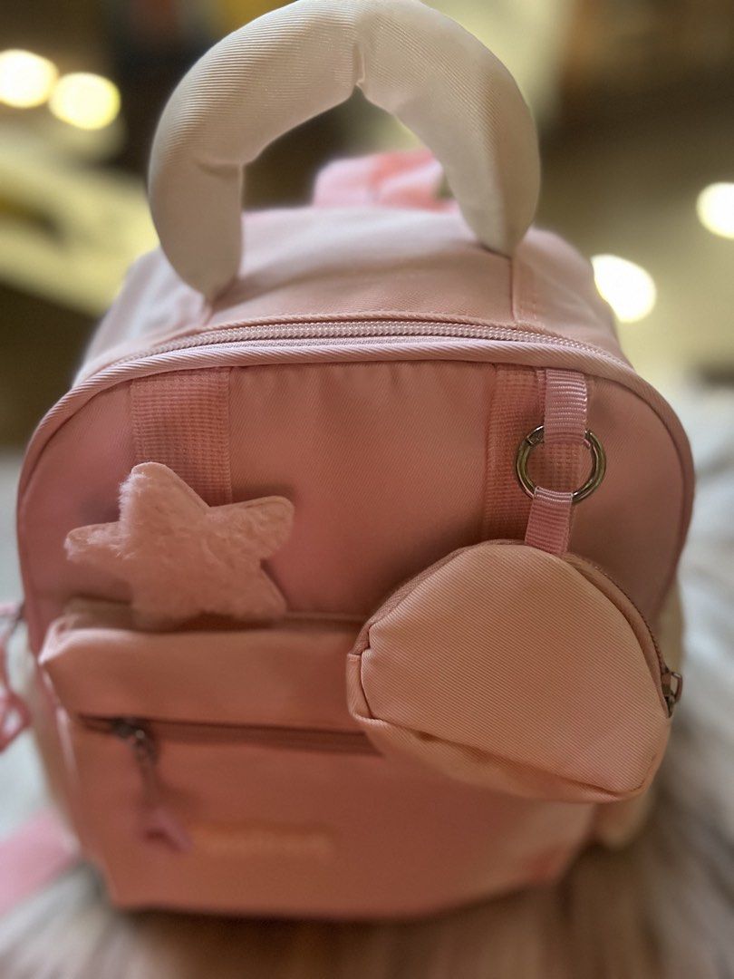 Pink My Melody Mini Backpack with Accessories (Category: Backpacks) located in Rizal. Submitted by safecat_3c0d85 (Listing ID 1469429743, Image 3). Description: - Cute pink mini backpack with bunny ears on top - Includes a detachable My Melody pouch and a fuzzy star charm - Front zippered pocket for small items - Adjustable straps for a comfortable fit - Clean pink fabric inside and out - Great day bag for Sanrio fans.
