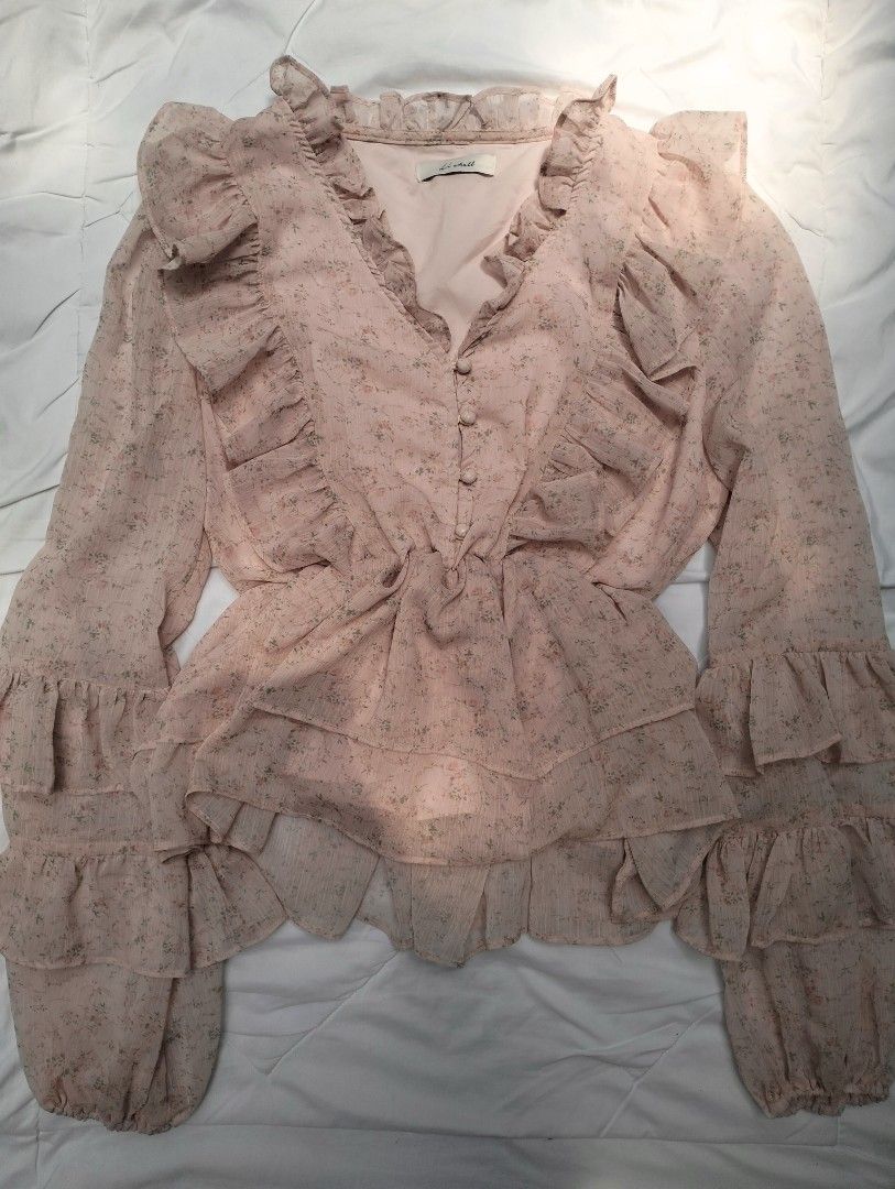 pink ruffled top (Category: Blouses) located in Manila. Submitted by caroliraee (Listing ID 1469496800, Image 1). Description: .