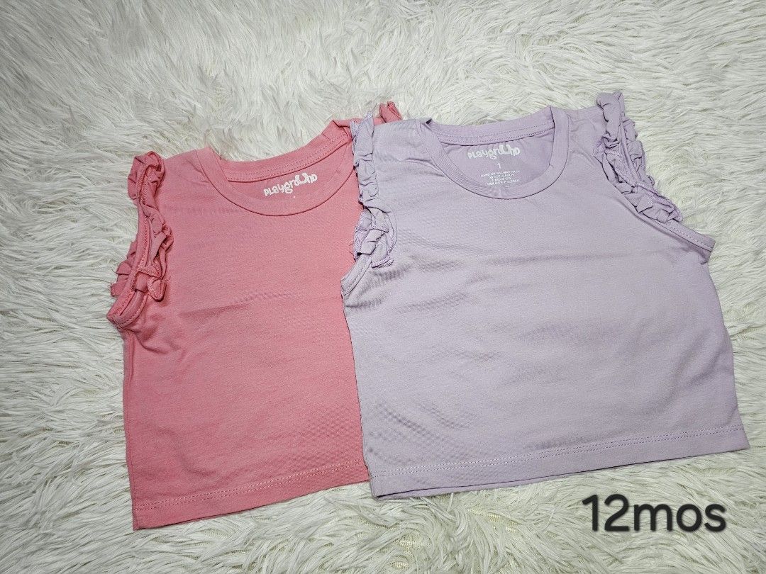 Playground ruffle sleeve tank top bundle 12mos (Category: Sleeveless) located in Manila. Submitted by pitzdiaz (Listing ID 1469497573, Image 1). Description: FOR SALE ❗️❗️❗️ Playground shirts (9-12mos) All from my daughter's budol 😁 *pink used once only *purple BRANDNEW These are preloved items, so please manage your expectations. Actual color and appearance may vary slightly due to lightning, photo angles, and device screen settings. Thank You 