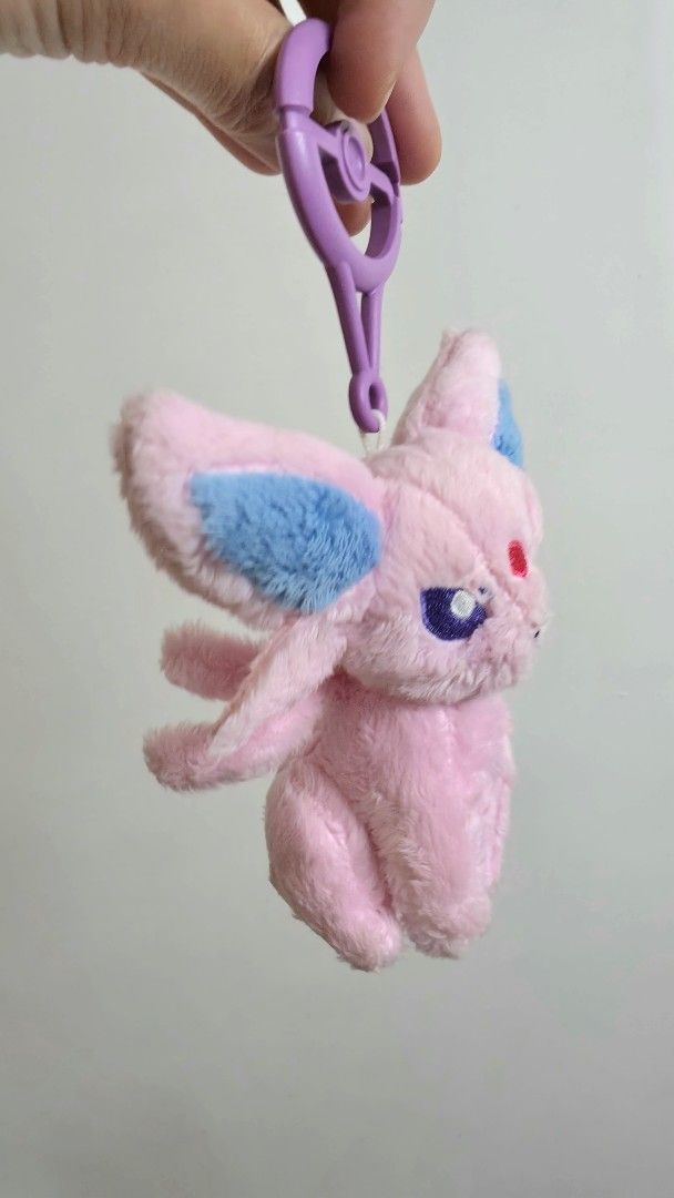 Authentic Pokémon Center Espeon Plush Key Chain (Category: Plushies & Soft Toys) located in Quezon City. Submitted by curatedbymissgee (Listing ID 1469393788, Image 2). Description: 💜 Authentic Pokémon Center Espeon Plush Keychain 💜 ✨ Add a touch of Pokémon magic to your everyday bag! - Authenticity: 100% authentic Pokémon Center merchandise from Japan 🇯🇵 - Character: Espeon, the adorable Psychic-type Pokémon - Condition: Unused, without orig