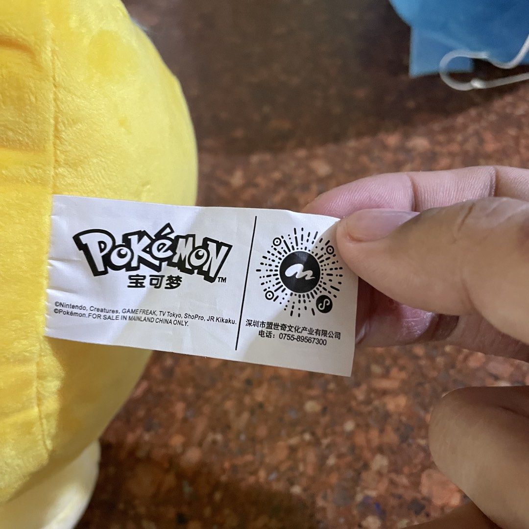 Pokémon Psyduck Plush Toy with Tag (Category: Plushies & Soft Toys) located in Manila. Submitted by jemiruxd (Listing ID 1469511354, Image 3). Description: - Authentic Pokémon collection Psyduck plush toy - Features iconic blank expression, wide beak, and black hair tufts - Made with super soft fabric all over - Includes original hanging tag with authenticity sticker - Comes with a rare sewn-in error label on the side - Standard size, clean, and 