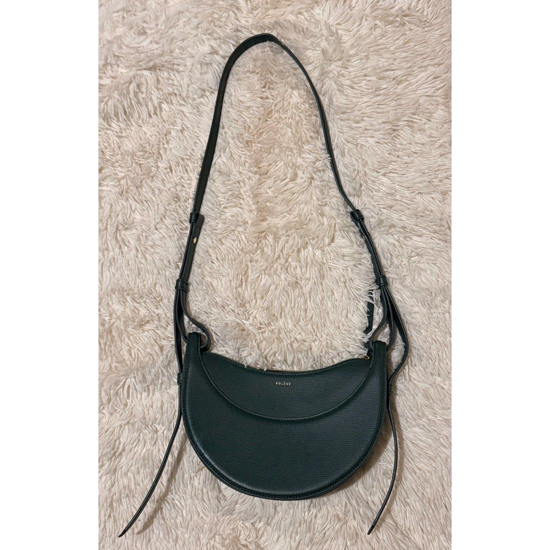 Polene Numero Dix Green (Category: Luxury Bags & Wallets) located in Pasay City. Submitted by erinsclosetph (Listing ID 1469421369, Image 1). Description: Polène Numéro Dix – Green Pre-loved Polène Numéro Dix in green, worn crossbody. Shows signs of wear, including stains and scratches on the leather. Lining and piping are in great condition, with a clean interior. Inclusions: None .