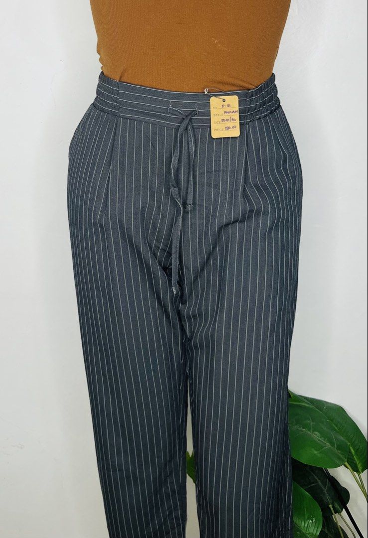 Polham Pinstripe Trousers Drawstring Waist Dark Grey (Category: Other Bottoms) located in Manila. Submitted by bengirlclothing (Listing ID 1467178537, Image 3). Description: - Brand: Polham -Size: 28-30 inches -Length: 36 inches - Color/Pattern: Dark grey with thin white pinstripes - Fit: Straight-leg cut - Waistband: Elasticated with adjustable drawstring - Pockets: Includes a back pocket with button closure - Style: Casual yet smart, perfect fo