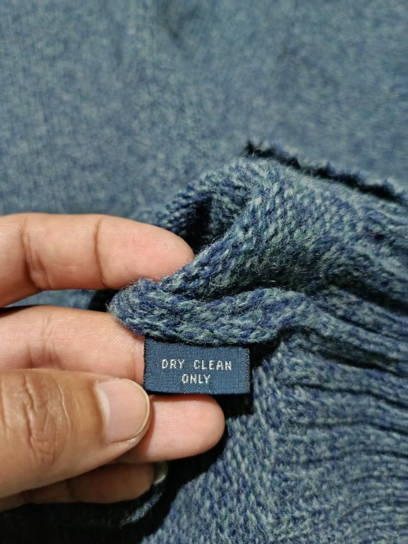 Polo by Ralph Lauren Wool Sweater Medium Blue (Category: Coats, Jackets and Outerwear) located in Barotac Nuevo. Submitted by gray101 (Listing ID 1469498009, Image 3). Description: - Brand: Polo by Ralph Lauren - Style: Knit sweater / Crew neck - Color: Blue marled yarn - Size: Medium (tag attached) - Details: Iconic red embroidered pony logo on chest, ribbed cuffs and hem - Care: Dry clean only - Condition: Excellent pre-loved condition.