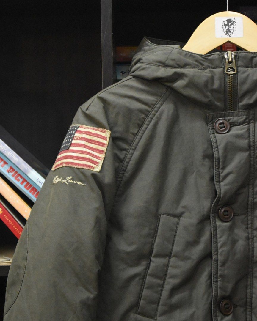 Polo Ralph Lauren Military Down Parka Olive Flag Patch Jacket (Category: Coats, Jackets and Outerwear) located in Baguio. Submitted by marcusmartin2600 (Listing ID 1469494717, Image 2). Description: Size: M on tag but fits Small Men Condition: Excellent | signs of usage 📏 Measurement via Tape Measure (in inches): Width: 20” Length: 27” Sleeve Length: 27.5” Hem: 20” . ————————— Note: Please check and ask for detailed photos before buying to avoid