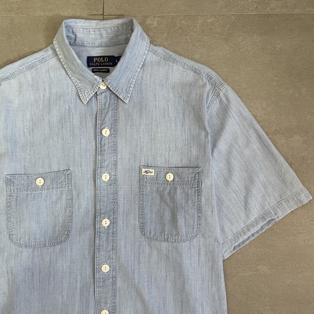 Polo Ralph Lauren Short Sleeve Buttondown (Category: Tshirts & Polo Shirts ) located in Mabalacat. Submitted by goldengarms_ (Listing ID 1469447613, Image 2). Description: Color: Denim Blue Size: Large on tag Dimensions: 23.5” Width / 29” Length Condition: Excellent Color rate: 9.5/10 or better Issue: N/A; minimal discoloration sa armpit unnoticeable Price is still negotiable for sure buyer 👍 - Payment thru GCash, Maya or Security Bank 💳 - Ship