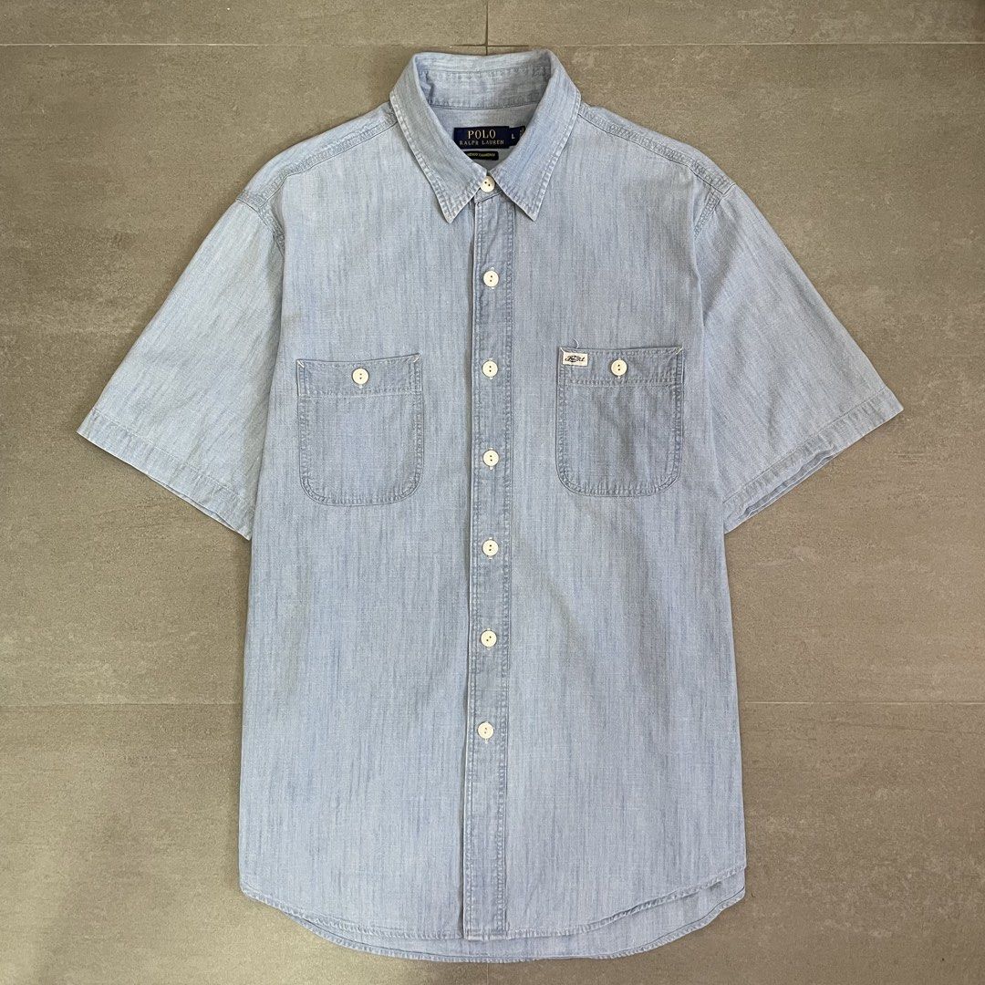 Polo Ralph Lauren Short Sleeve Buttondown (Category: Tshirts & Polo Shirts ) located in Mabalacat. Submitted by goldengarms_ (Listing ID 1469447613, Image 1). Description: Color: Denim Blue Size: Large on tag Dimensions: 23.5” Width / 29” Length Condition: Excellent Color rate: 9.5/10 or better Issue: N/A; minimal discoloration sa armpit unnoticeable Price is still negotiable for sure buyer 👍 - Payment thru GCash, Maya or Security Bank 💳 - Ship