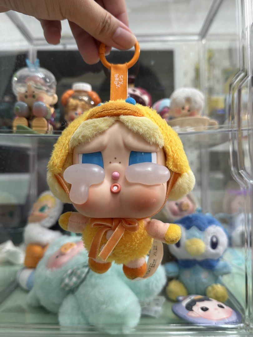 Popmart Crybaby Sad Duck (Category: Plushies & Soft Toys) located in Antipolo. Submitted by penguinaryfindsmd (Listing ID 1469550554, Image 1). Description: NO BOX OR CARD LAST PRICE ALREADY = 400 ❗️Please note the stain on its left foot :( No issues with stitching Intact everything Stored in acrylic box and unused after the foot stain .
