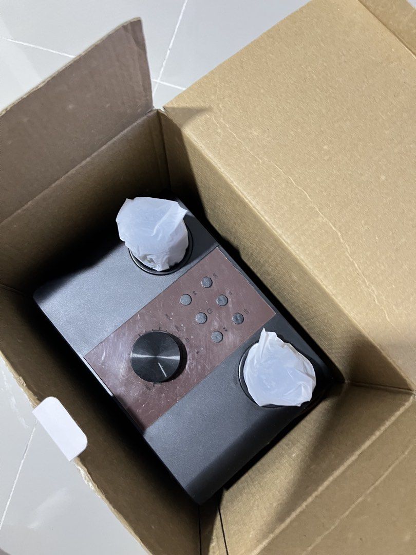 RUSH SALE Portable Bluetooth Speaker with Leather Handle and Volume Knob - NEGO (Category: Soundbars, Speakers & Amplifiers) located in Manila. Submitted by curated.clutter12 (Listing ID 1469516232, Image 3). Description: - Color & Design: Sleek black finish with a premium brown leather carrying strap - Controls: Features a large volume dial and multiple easy-access buttons on the top panel - Connectivity & Ports: Equipped with an auxiliary jack,
